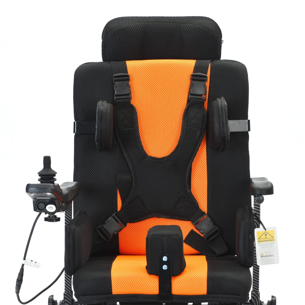 Front view of Bangeran Pegasus Cerebral Palsy wheelchair with black and orange seat, headrest, and safety harness.
